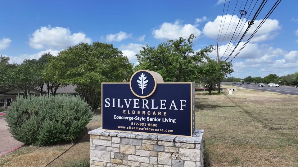 Silverleaf Eldercare monument sign in limestone at the Bee Caves Road entrance to the campus