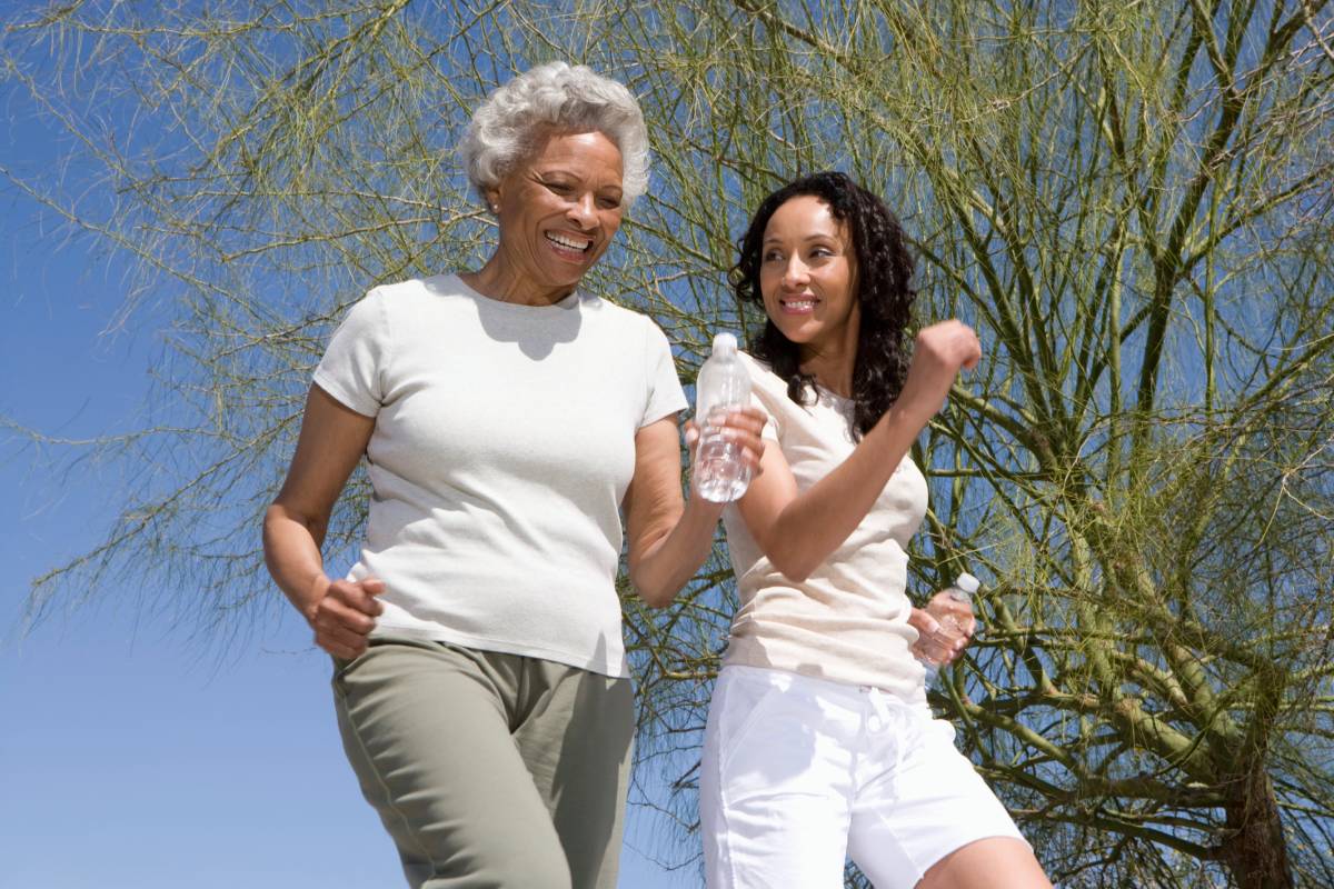 Daughter and senior mother exercising together- Assisted living facilities and retirement homes in Austin
