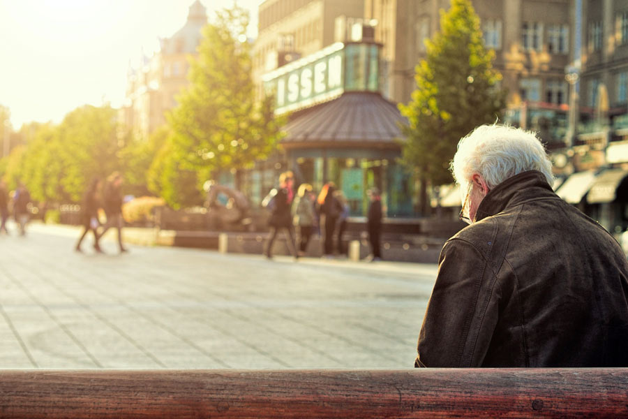 Senior alone on a bench